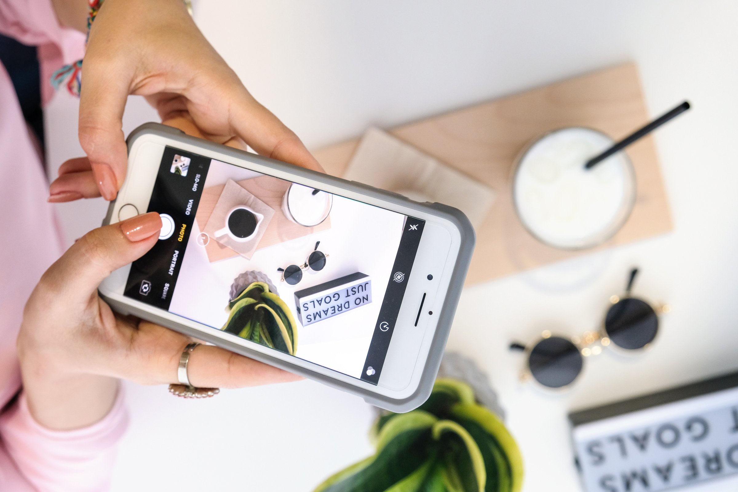 Person Taking Photo of Milk and Coffee